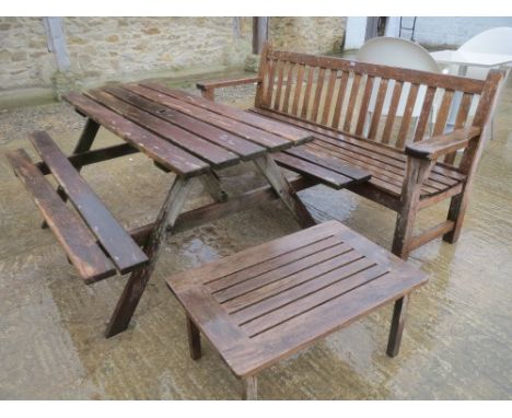 Teak Straight back garden bench, small table, and a picnic bench, all weathered