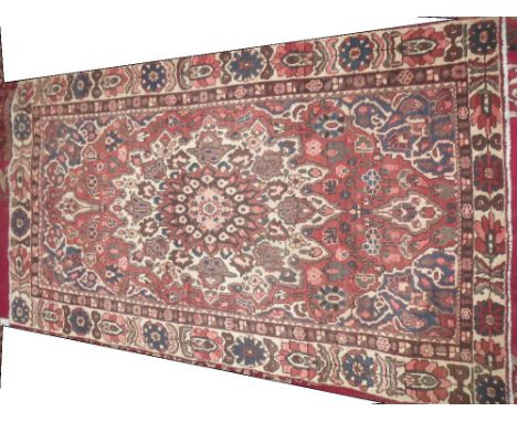 Hamadan carpet rust ground with all over floral motifs