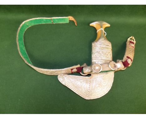 Jambya dagger with horn handle and white metal decorated scabbard