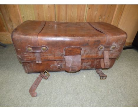 An Army & Navy Cooperative Society leather trunk with original red canvas lined interior and outer straps