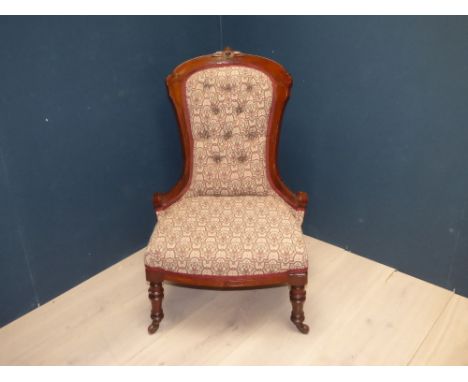Victorian carved walnut framed, button upholstered nursing chair