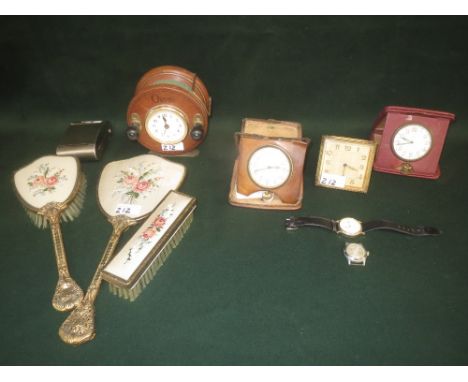 Four mixed travel clocks, one by Noxa, two gentleman's wrist watches, dressing table brush set and Orvis fishing reel clock