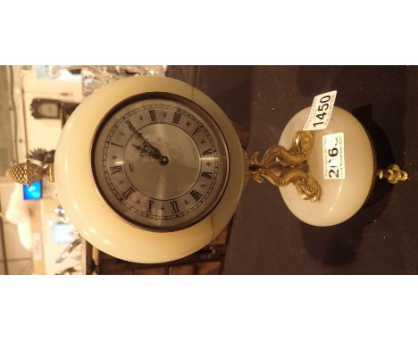 Green onyx Xavier clock with brass fish support and feet plus a green onyx five sconce candelabra 
