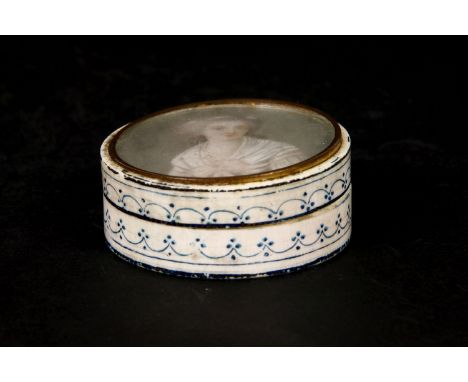 An 18th Century century ivory circular snuff box, with painted miniature portrait to the top, diameter 6cm