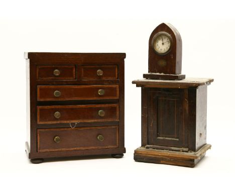 A 19th century mahogany apprentice chest, two short over three long graduated drawers, leg with apprentice coal purdonium and