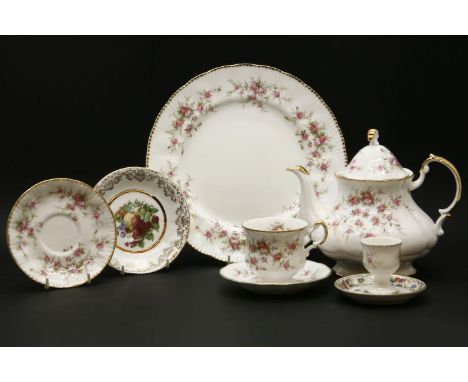 A large quantity of Paragon 'Victoriana Rose' pattern tea ware, comprising teapot, coffee pot, water pot, cups, saucers, side