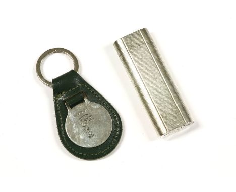 A Cartier silver plated lighter, with engine turned decoration, and in a fitted box, together with a hallmarked silver golf k