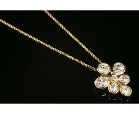 A Christian Dior gold-plated, Swarovski crystal, cluster pendant necklace,A circular and pear-shaped Swarovski crystal, rub s