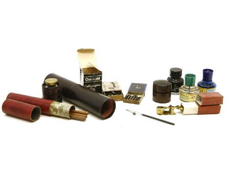 A collection of writing pen nibs, fountain pen nibs, inks, inkwells, travelling pencil holders and a cased set of sovereign s