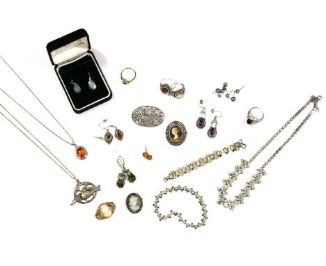 A collection of costume jewellery, to include a silver single stone citrine ring with floral filigree shoulders, a silver Cel