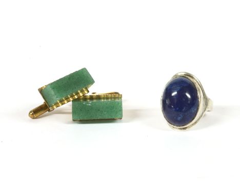 A sterling silver single stone blue jasper cabochon ring, dated 1970, Birmingham, a pair of gold aventurine rectangular baton