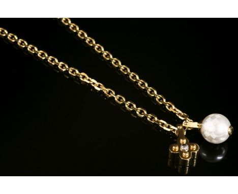 A Louis Vuitton gold-plated flower charm and simulated pearl pendant necklace,a single stone pearl charm, printed with a cheq