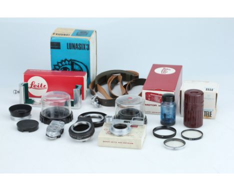 inclduing a Leica Meter, several Leitz lens bubbles, filters, and more,