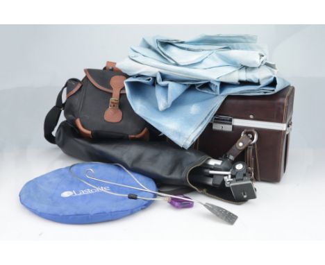 including a tripod, background, camera cases, and more