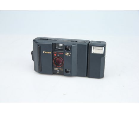 body G-VG, camera powers on with batteries, shoots and winds okay, flash untested, optics G,