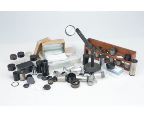 various microscope eyepieces, objective changer, filters, Beck bench magnifying glass, cavity well and oversize microscope sl