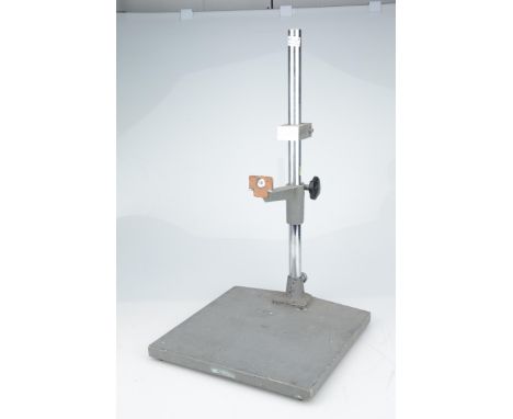 with a standard camera tripod thread, fixes the camera at a 45 degree angle for copy work,