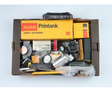 including a Kodak Roll-Film Tank, a Kodak Print Tank, Canon Speedlight 300 TL, a set of sealed bellows, a Goerz Dopp.-Anastig