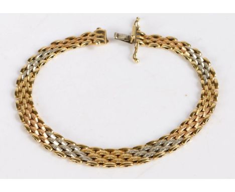 18 carat gold tri-metal gate link bracelet, stamped 750, 21cm long 13.6 grams&nbsp;
