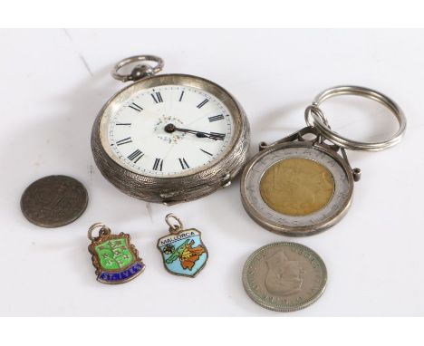 White metal pocket watch set with a white dial and Roman numerals together with three coins and two pendants (6)&nbsp;