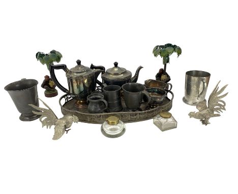 Pair of metal palm tree and monkey candlesticks, pewter measures, plated tea set etcDimensions: Height:&nbsp;75cm&nbsp; Lengt