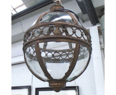 GLOBE LANTERN, in a bronzed metal framed, 41cm diameter plus chain.