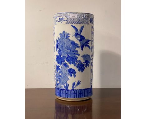 A Chinese style blue and white ceramic stick stand of cylindrical form H47cm