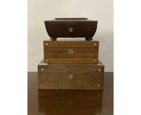 Two mid 19th century rosewood and mother of pearl inlaid jewellery boxes, one silk lined and the other paper lined with fitte