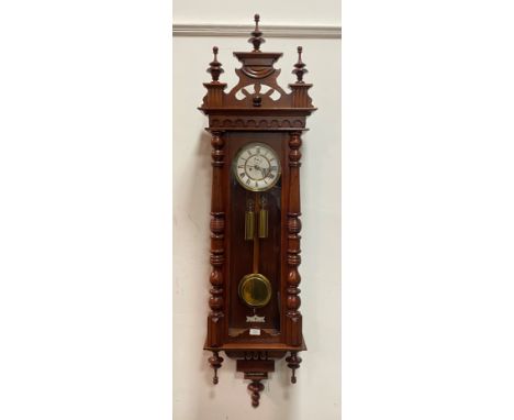 A Late Victorian Vienna style regulator wall clock, the ivorine dial with Roman chapter ring and subsidiary seconds dial, eig