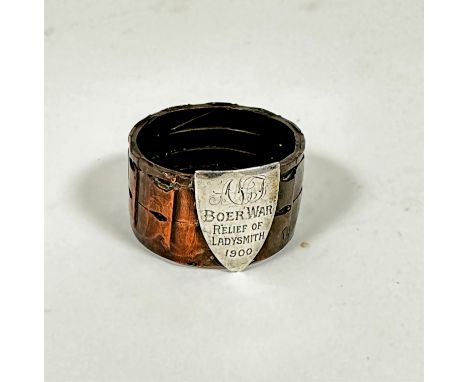 Trench Art:-  A copper Boer War napkin ring of circular form with white metal shield plaque, AAF Boer War Relief of Lady Smit