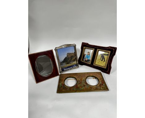 A Birmingham silver shaped photograph frame with original oak backing and easel stand, shows damage to left side, (27.5cm x 2
