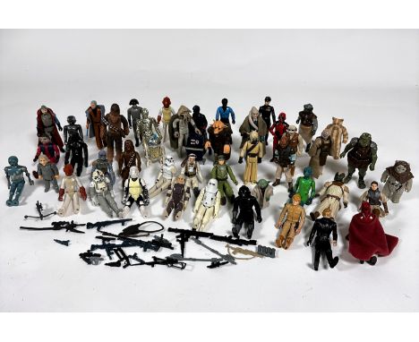 A collection of approximately 42 Star Wars 1977/78/80/82 and '83 figures including Luke Skywalker, Darth Vader 1977, Chewbacc
