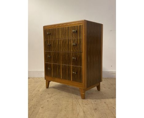 A mid century walnut chest by Lebus, circa 1960's, fitted with four drawers, raised on square tapered supports, marks to top 