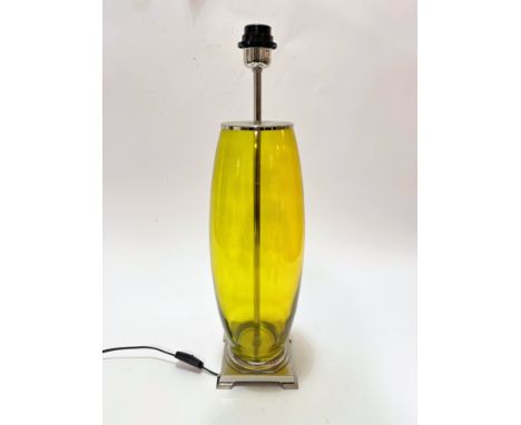 A lemon coloured glass ovoid table lamp with chrome mounted top and stepped square base, (including light fitting 63cm x 16cm