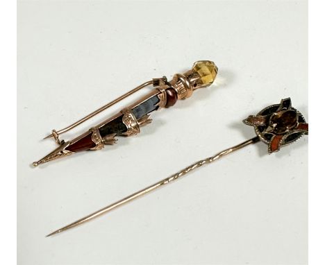 A Victorian yellow metal engraved dirk brooch with faceted citrine mount to top and hardstone panels, missing two small citri