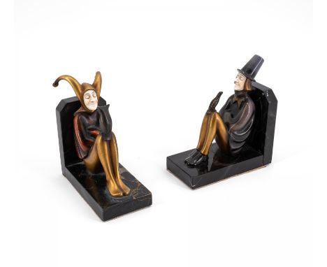 ZWEI BUCHSTÜTZEN MIT NARREN. , Roland. Paris. Datierung: 20. Jh. Material: Stein, Bronze, tlw. rot patiniert, Bein. Beschreib