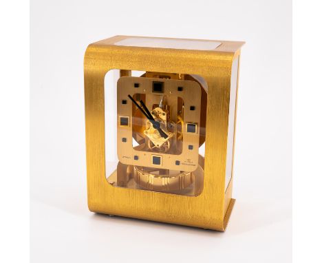 ATMOS "COLANI". Jaeger LeCoultre. Entwerfer/Meister: Entwurf Luigi Colani. Technik: Glas, vergoldetes und gebürstetes Messing