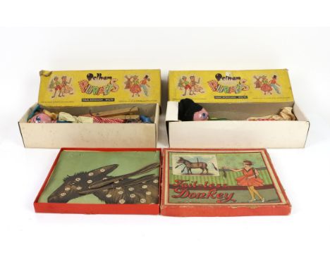 Two Pelham Puppets, Dutch Boy and Dutch Girl, both boxed and a Tail-less Donkey vintage game (3). 