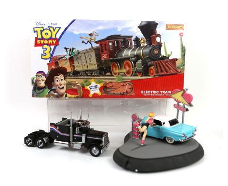 Hornby 00 gauge Toy Story 3 electric trainset, tin plate car track, Franklin Mint car with girl on roller skates and a Frankl