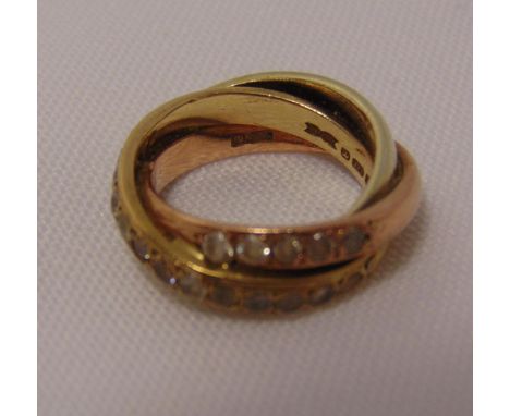 9ct two colour gold and diamond crossover ring (one stone missing) approx total weight 6.4g