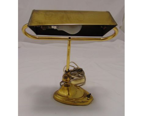 An early 20th century rectangular brass desk lamp on raised shaped oval base, 39cm (h)