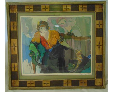Isaac Tarkay framed and glazed polychromatic lithograph of a female figure titled Lady in Armchair 92/ 250, signed bottom rig
