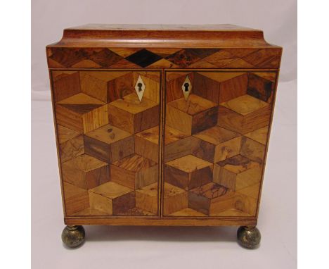 A Regency rectangular jewellery casket with marquetry sides and hinged cover, the hinged doors revealing three graduated draw
