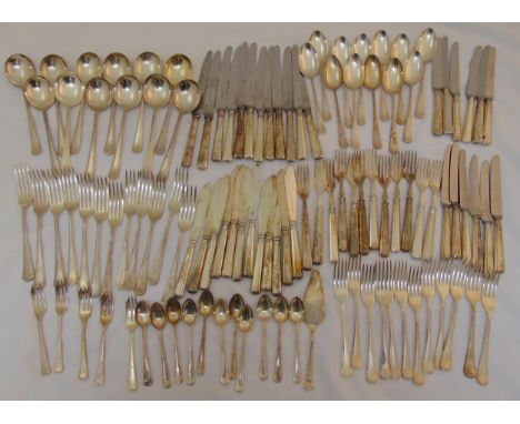 A quantity of silver plated flatware to include knives, forks, spoons, fish knives and forks