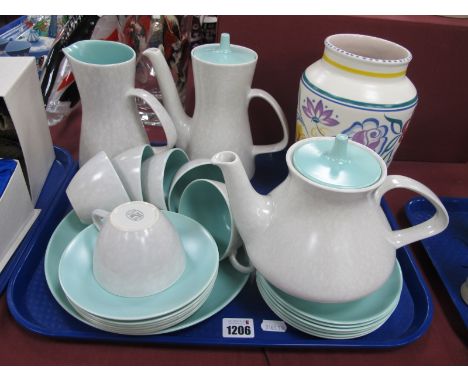 Poole Pottery Two Tone Table Ware, of twenty two pieces, including tea coffee pots, sylized vase impressed 595.