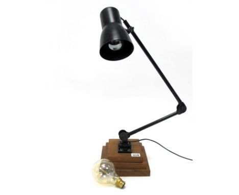 An Industrial Style Angle Poise Lamp, in black metal on stepped wooden base (Untested - Sold For Parts Only).