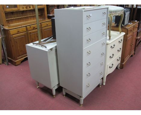E. Gomme for G Plan Light Grey Chest of Seven Drawers, with fixed slanted gilt loop handles, 60.5cm wide, a matching four dra