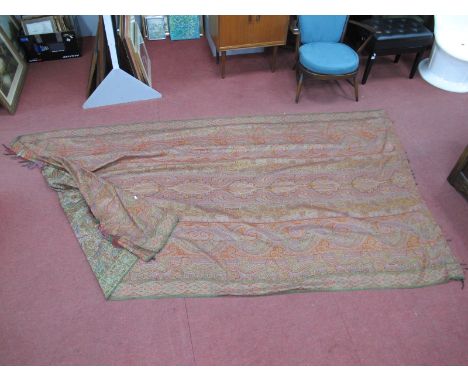 A Paisley Vintage Throw, in traditional colours, green border, tasseled ends, approximately 330cm x 160cm.