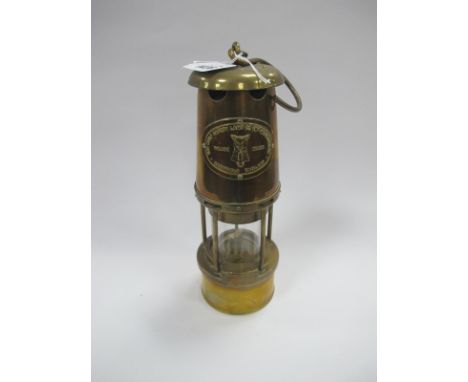 A Brass Miners Lamp (The Wolf Safety Lamp Co, Sheffield), 28cm high.