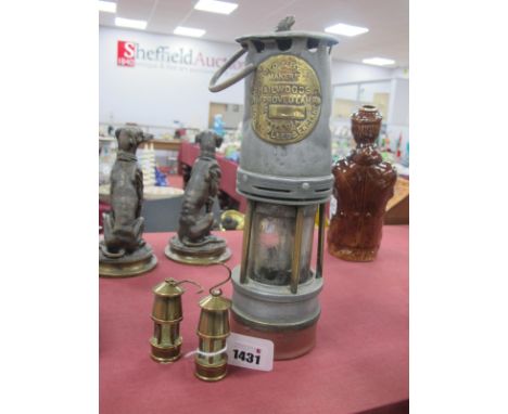 Hailwood's Improved Miners Lamp, 26.5cm high with handle down, plus two miniature examples (3).